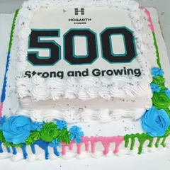 We celebrate your company's achievements with you. This custom two-tier cake was created for Hogarth Studios to mark their milestone of reaching 500 employees, demonstrating our ability to create branded desserts for your special corporate occasions.