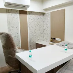 For a more subtle office design, I can install panels of patterned wallpaper combined with plain textures. This creates a sophisticated and professional look for an executive cabin.