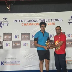 One of our Under-17 players receiving his trophy after securing 3rd place at the Inter-School Table Tennis Championship. Competing in such events is a core part of our training program.
