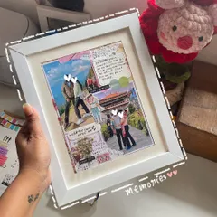 A beautiful memory frame I created for a customer. It's like a mini scrapbook, filled with their favorite photos, little notes, and cute stickers to capture a special relationship.