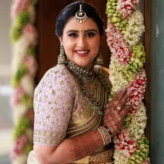 A happy, radiant smile from my client at her housewarming ceremony. This close-up shows the soft glam makeup with a subtle pink lip and defined eyes, perfectly matching her elegant saree.