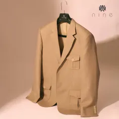 This rich beige jacket is another example of our lightweight construction. It features functional pocket details and is tailored from breathable fabric for all-day comfort.