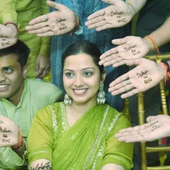 A fun and creative shot from the mehendi ceremony, with all the "Dulhan ka Bhai" hands framing the beautiful bride.
