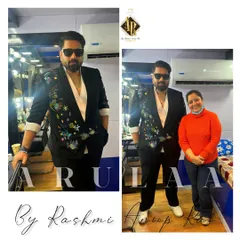 This black blazer for Tharun Sudhir was a fun project. We hand-painted a vibrant, abstract floral design on it, making a standard black blazer into a unique statement piece for his appearance on the TV show 'Mahanati'.