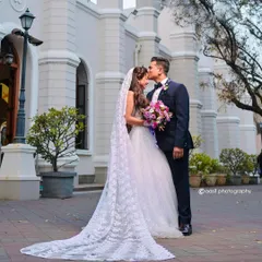 For the bride dreaming of a classic white wedding. This elegant Christian wedding gown features a beautiful silhouette and a long, detailed veil, creating a picture-perfect look for your walk down the aisle.
