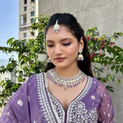 The outdoor lighting highlights the beautiful, dewy finish of her skin. This is a perfect example of my "less is more" approach for bridesmaids and family members.