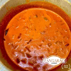 A close-up of our signature Mangaluru Southekayi Huli, a flavourful cucumber curry from the coastal region of Karnataka. This dish is a perfect example of the authentic regional recipes we specialize in.