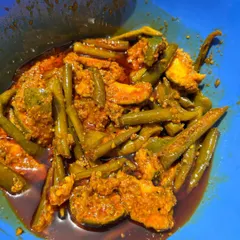 A close-up of the delicious Mango Chilli pickle. The perfect balance of tangy, sweet, and spicy in every single bite.