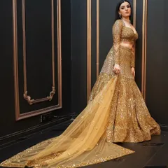 A dramatic, full-glam look featuring a magnificent golden lehenga. I created bold smoky eyes and radiant skin to complement the grandeur of the outfit, perfect for a wedding reception or sangeet night.