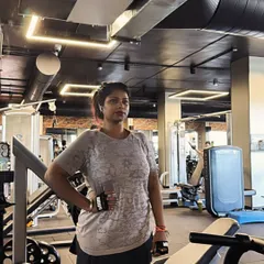A front-facing pose during a workout session. It's important to feel good in your gym wear and confident in your body as you work towards your fitness goals.
