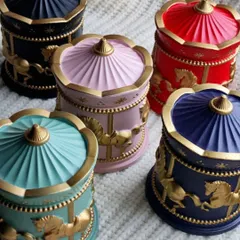 Our magical carousel candles are where golden fantasies meet a glowing reality. Available in a range of colors like red, blue, pink, and turquoise, they make for a stunning and unique party favor.