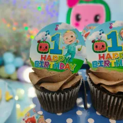 Here are the Cocomelon cupcakes on display at the party. They are a great addition to a themed cake and super easy for little guests to enjoy.
