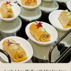 A close-up of our Lamb Adana Phyllo with a cooling mint emulsion, showcasing the delicate presentation and thoughtful flavor pairing.