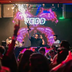 Lighting it up with a pyro gun. I use every tool at my disposal to make sure the energy in the club is always at its maximum.