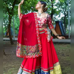 Capturing the vibrant energy of ethnic fashion in an outdoor setting. This dynamic shot of a model in a red chaniya choli shows how I use movement and natural environments to create lively and expressive portraits.