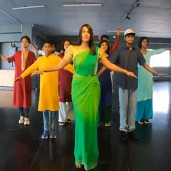 We offer specialized classes that dive deep into specific styles. This poster announces our popping course, where students explore popping, boogaloo, and tutting, learning fundamental drills and techniques from South India's first female popper.