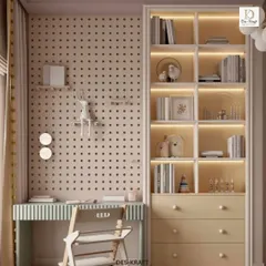 This functional study area includes a pegboard wall for customizable storage, a sleek desk, and a built-in bookshelf with warm backlighting for a cozy glow.