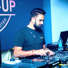 A candid shot of me mixing during a set. You can see my focus as I line up the next track on the Pioneer DJ gear.