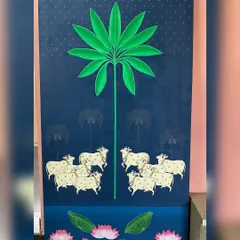A full, straight-on view of the large Pichwai canvas. The deep blues and vibrant green create a stunning contrast, making it a powerful centerpiece for any room.