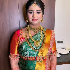 The final look for Prathiba's baby shower. The HD makeup provides a flawless base that lasts through all the rituals and photos, ensuring she looks and feels her best.