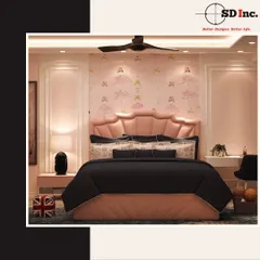A whimsical bedroom designed for a little princess. The room features a scalloped pink headboard, ballerina-themed wallpaper, and a touch of British flair with a Union Jack stool, creating a space where dreams can take flight.