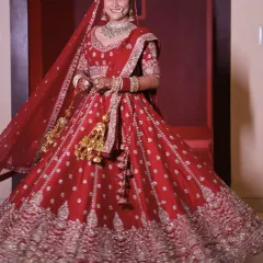 This bride is a vision in her twirling red lehenga. I created a look with a radiant base and defined eyes to match her royal vibe, ensuring she felt like a queen on her big day.