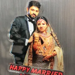 This acrylic photo cutout magnet is a wonderful way to commemorate a wedding. The magnet is shaped perfectly to the couple's outline, creating a lasting memory for your fridge.