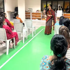 Our educators are lifelong learners. A teacher leads a workshop for her peers, sharing knowledge and fostering a collaborative spirit.