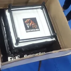 Even our celebration cake is on theme. We believe in making hard work fun, and this custom MMA ring cake for our anniversary shows the spirit and camaraderie that defines our gym.