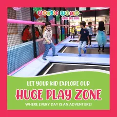 Kids bouncing with joy in our dedicated trampoline zone. This safe, netted area lets them jump and explore freely.
