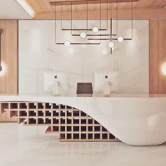 This unique reception desk combines a sculptural white counter with a built-in wooden wine rack, perfect for a hospitality or high-end corporate setting. The modern pendant and wall lights add to the artistic and luxurious feel.