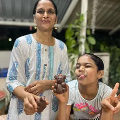 A mother and daughter enjoying a playful moment during one of our parent-child workshops. Creating with clay is a wonderful way to bond and have fun together.