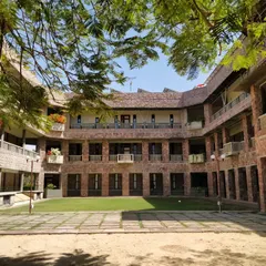A view of the IIHMR University campus in Jaipur, nestled in greenery. We used local stone and designed the buildings around linked courtyards, creating a space that feels rooted in its environment and encourages interaction and learning.
