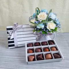 A classic Father's Day gift set featuring my 12-piece handmade chocolate praline box alongside a fresh floral arrangement. It's an elegant and timeless way to show your appreciation.