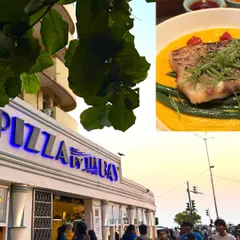 The view from Pizza By The Bay, a classic Mumbai experience where the sea breeze meets city life.