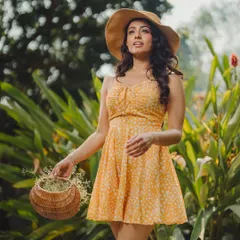 A candid, in-motion shot that feels natural and unposed. It effectively shows how the dress moves and looks in a real-world environment.