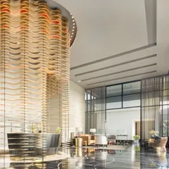 The Godrej South Estate Experience Centre is designed to guide visitors through an immersive brand story. The central modular facade, crafted from layered MDF plates, creates a dramatic focal point while defining the circulation path through the expansive, light-filled space.