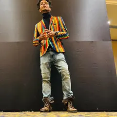 A full-body shot showing off a more formal, eclectic style for an event. Fashion and dance are both forms of self-expression for me.