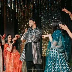 Our lead choreographer enjoying a dance with the bride's squad. We become part of the family and love celebrating with you on the dance floor.