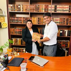 Receiving the book 'Unsung Warriors' from Advocate Aditi Sharma in my office. It is important to support the work of colleagues who highlight our nation's history.
