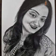 This custom portrait sketch highlights the subject's gentle expression and traditional details like the bindi. I use soft shading to create a realistic and delicate feel in my female portraits.