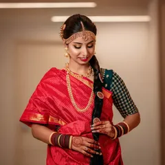 My bride Manasa, the picture of timeless grace for her muhurtham. We went with classic gold eyes, a bold winged liner, and stunning red lips to match her beautiful Madisar drape.