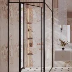 The walk-in shower is enclosed by a black-framed glass partition, adding a modern contrast to the soft, feminine materials. Inside, illuminated niches provide elegant storage for bath essentials.
