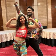 With ZES Shiv Kewat. It was a pleasure working with him at a corporate event. I love flexing my non-existent biceps.