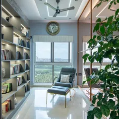 I believe every home needs a quiet corner for reflection. This reading nook, with its stunning view, is designed for just that. The built-in bookcase with integrated lighting and a comfortable lounge chair create a perfect retreat for getting lost in a good book.