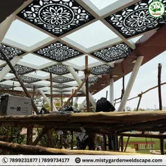 This architectural 12mm toughened glass pergola in Mahalakshmi Layout is a perfect example of how I blend strength and elegance. The custom-designed CNC panels integrate seamlessly with the glass, creating a stunning visual effect while ensuring the structure is safe, durable, and perfectly aligned with the building's existing architecture.