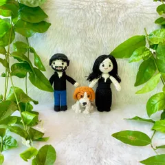 A full view of the happy family I crocheted. Creating replica dolls of people and their pets is one of the most rewarding parts of my work.