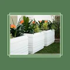 For a more classic or transitional look, these white trough planters are a great choice. Their clean lines and bright finish provide a fresh backdrop for colorful flowers and lush greenery, perfect for lining a walkway or defining a patio edge.