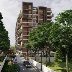 This view shows the apartment building nestled within a green, park-like setting. The tree-lined street and landscaped grounds create a buffer from the city, making the pool area feel even more like a secluded retreat. My focus is always on how the entire environment works together.