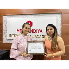 A happy moment as a student completes her course. This certificate is the first step towards a successful and independent career in the beauty industry.